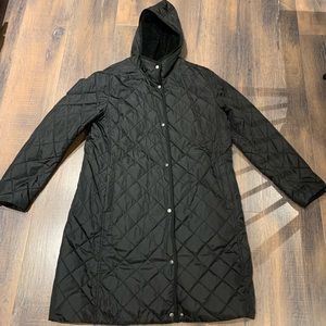 Uniqlo black quilted jacket gently used.